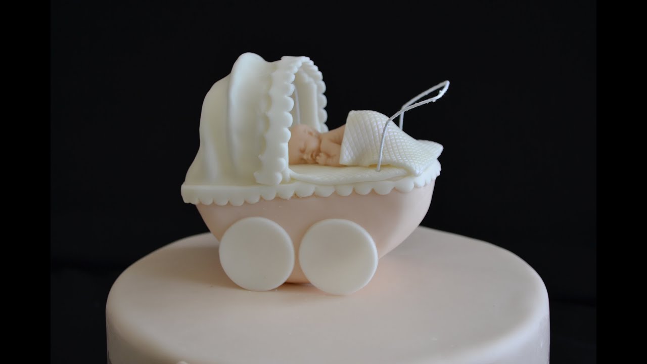 How to make baby carriage and baby for cake decorating.