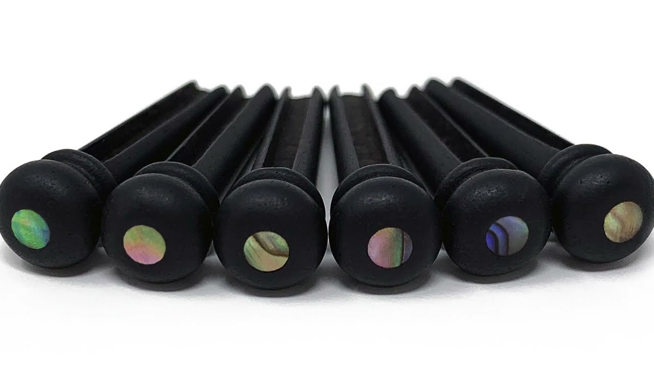 Crosby Pure Ebony Bridge Pins vs. Plastic Bridge Pins. Which are Best?