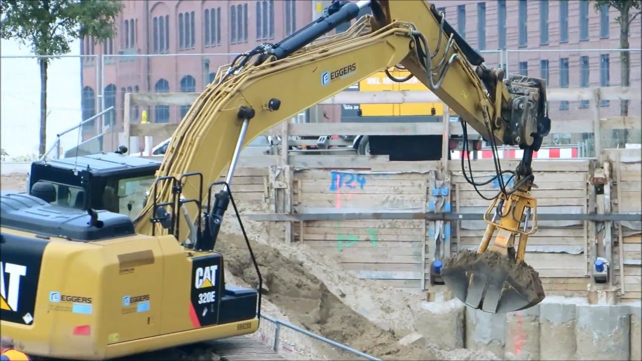 Soeren66 - Bagger CATERPILLAR 320E mit Quick Oil 2 Schalengreifer bei Baggerarbeiten