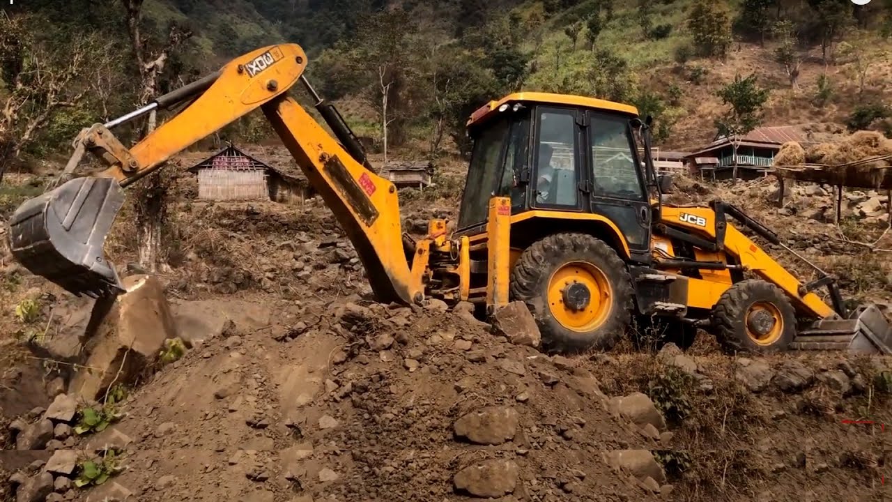 JCB Backhoe 3DX Machine Working Hill Land - JCB Pulling Out Stones Hilly Field