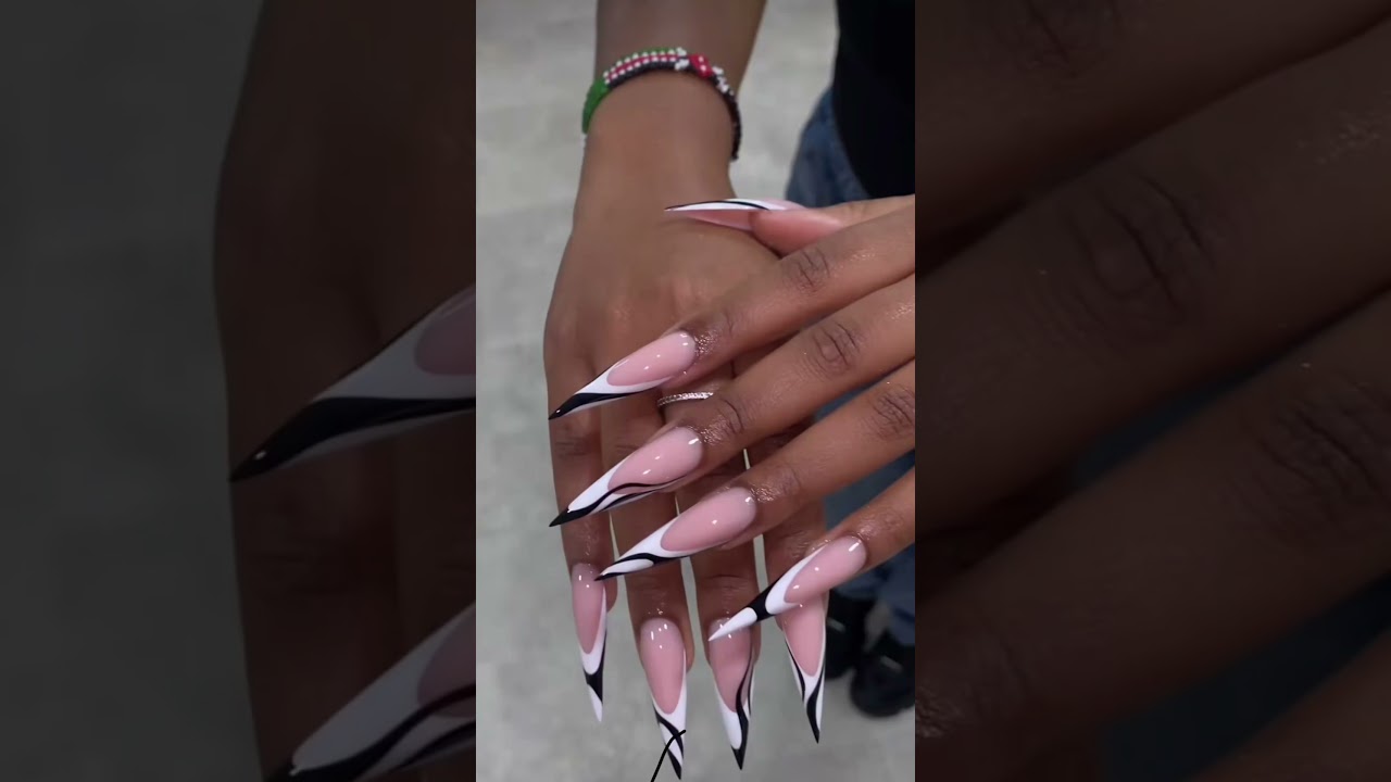Stiletto French tip with black swirls ✨ #frenchtips #stilettonails #naildesigns #nailinspo