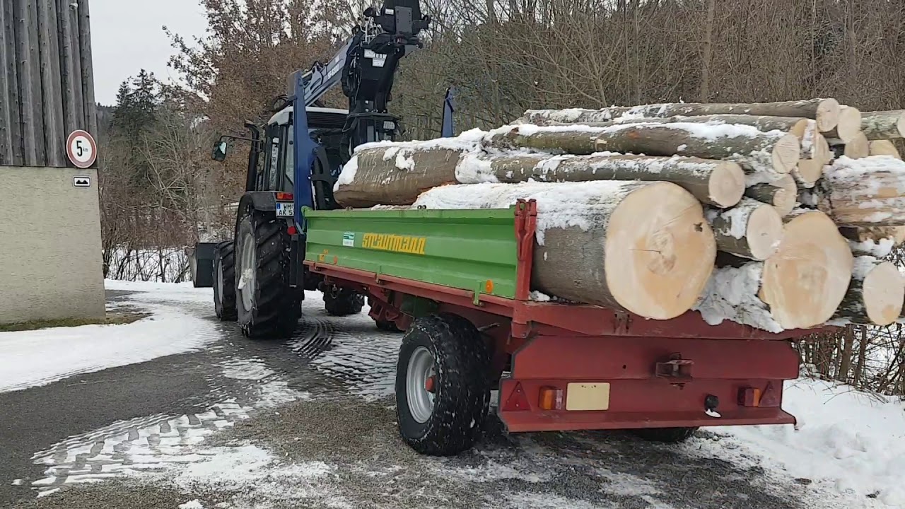 Deutz Agroplus zieht Kipper voller Buche