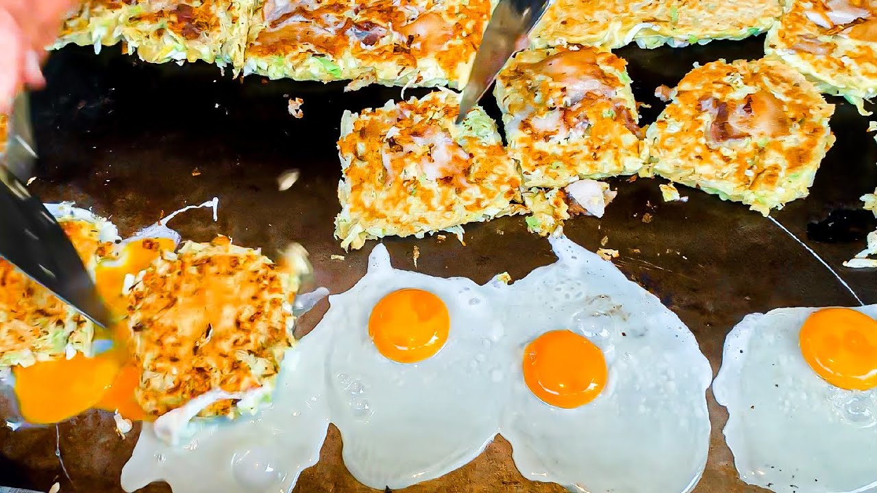 [1$]  Old style Okonomiyaki stall in a Japanese slum Nishinari in Osaka,Japan - Japanese street food