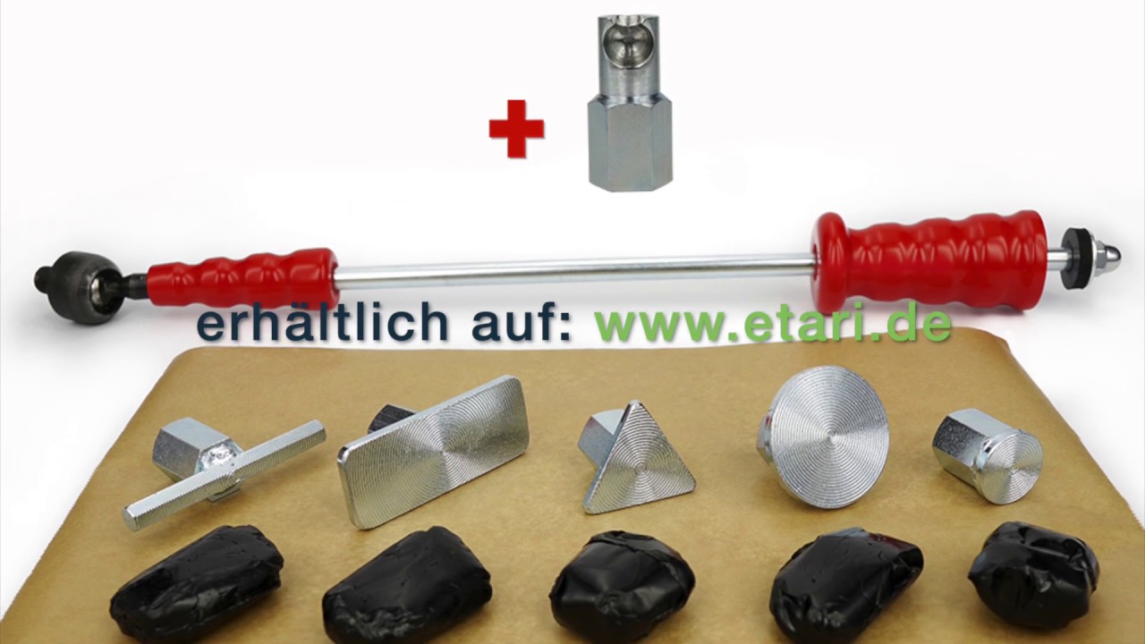 Dellenentfernung an hinterem Kotflügel mit Zughammer und Kaltkleber Cola Fria