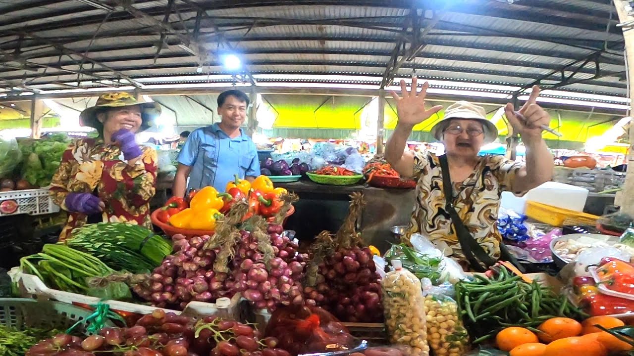 Outdoor food market, Go Cong, Tien Giang province, Vietnam.