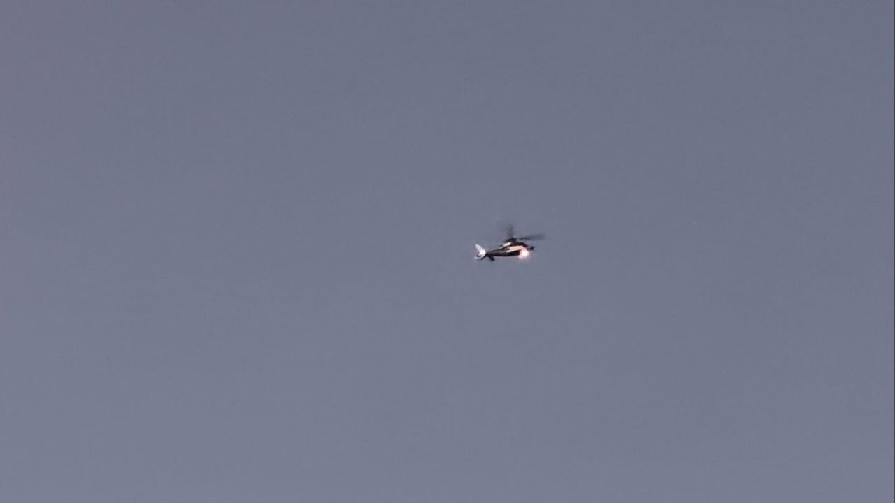 Private Aerospatiale AS365 Dauphin [G-MFLT] flying above during a frosty morning