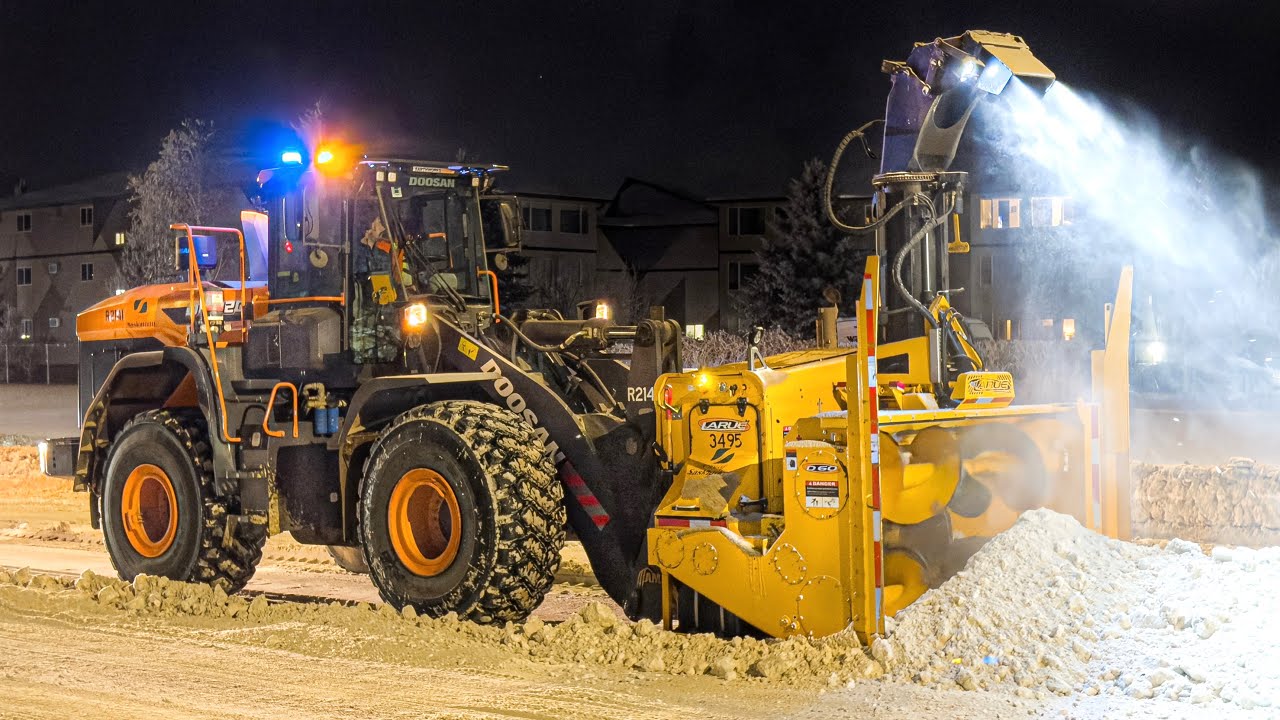 Massive Snow Removal Operation With Snow Blowers and Graders