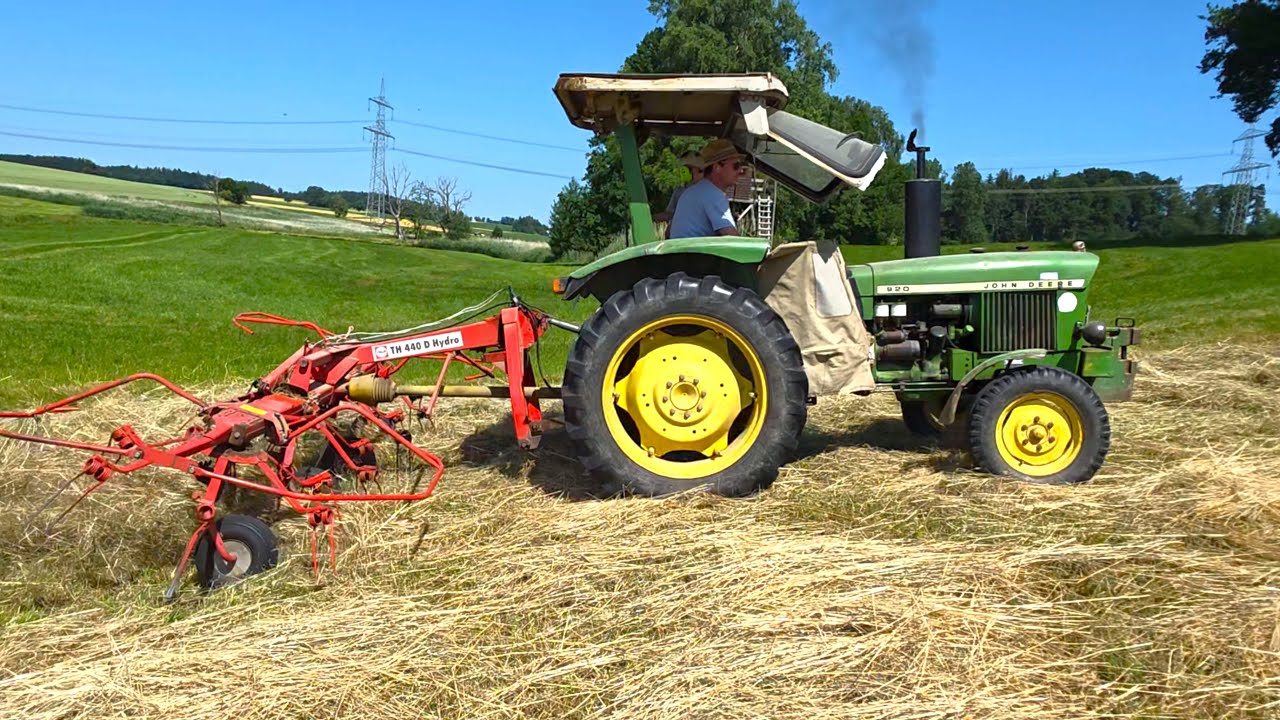 John Deere 920 anno 1970 & John Deere 2850 & John Deere 1140 & Jonny 5720 at hay harvest in Bavaria
