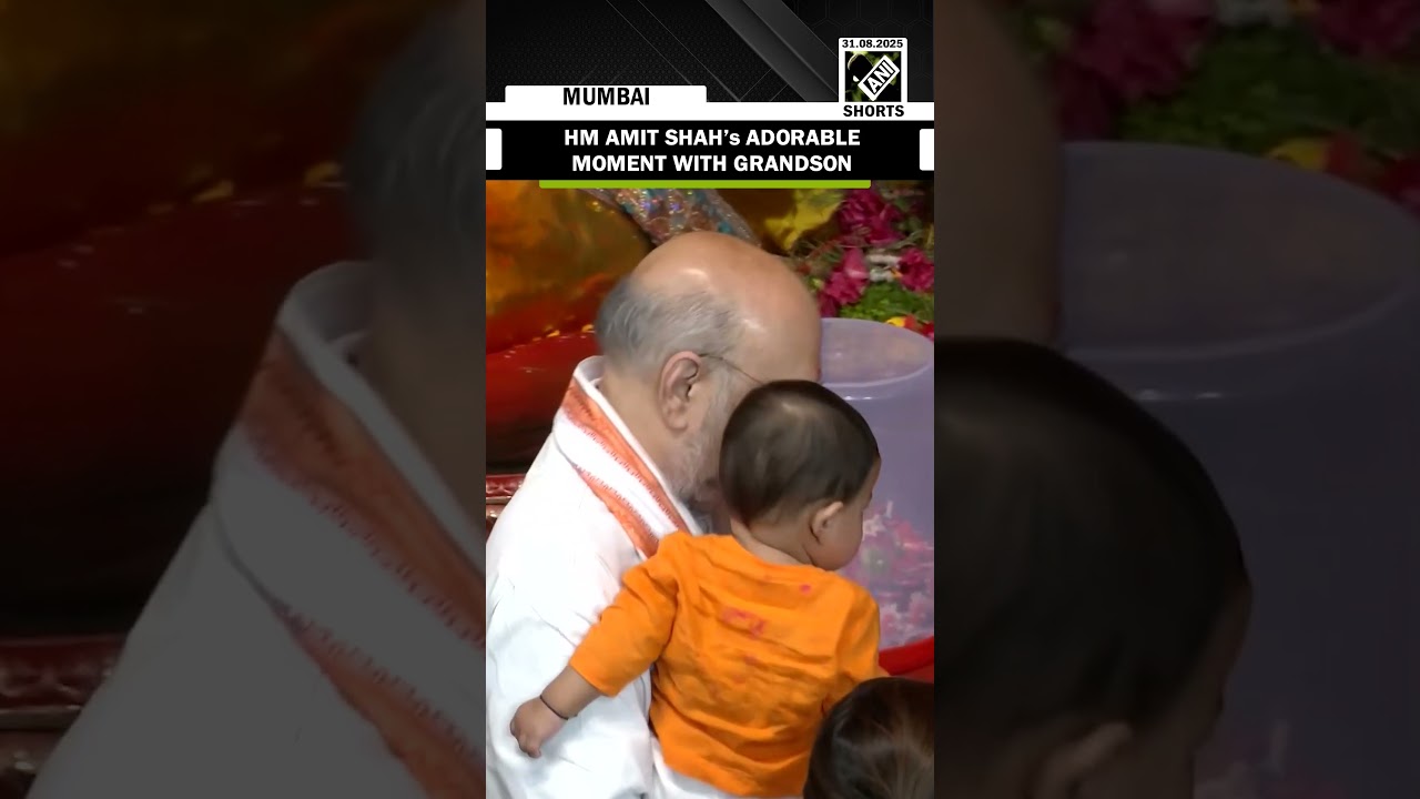 HM Amit Shah shares heartfelt moment with grandson while offering prayer at Lalbaugcha Raja
