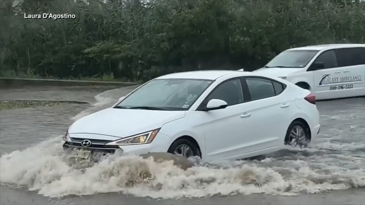 1 dead after torrential rains and flooding sweep Northeast