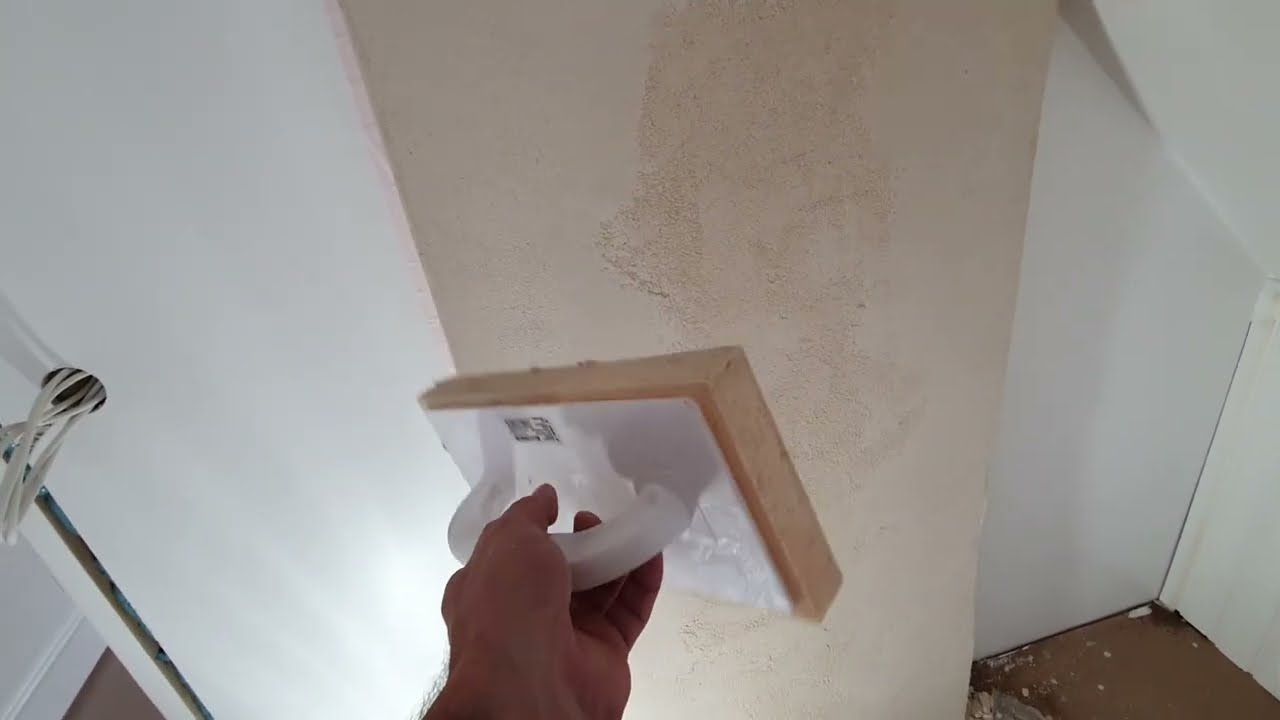 Plastering, rendering, finishing the chimney or brick wall with lime plaster