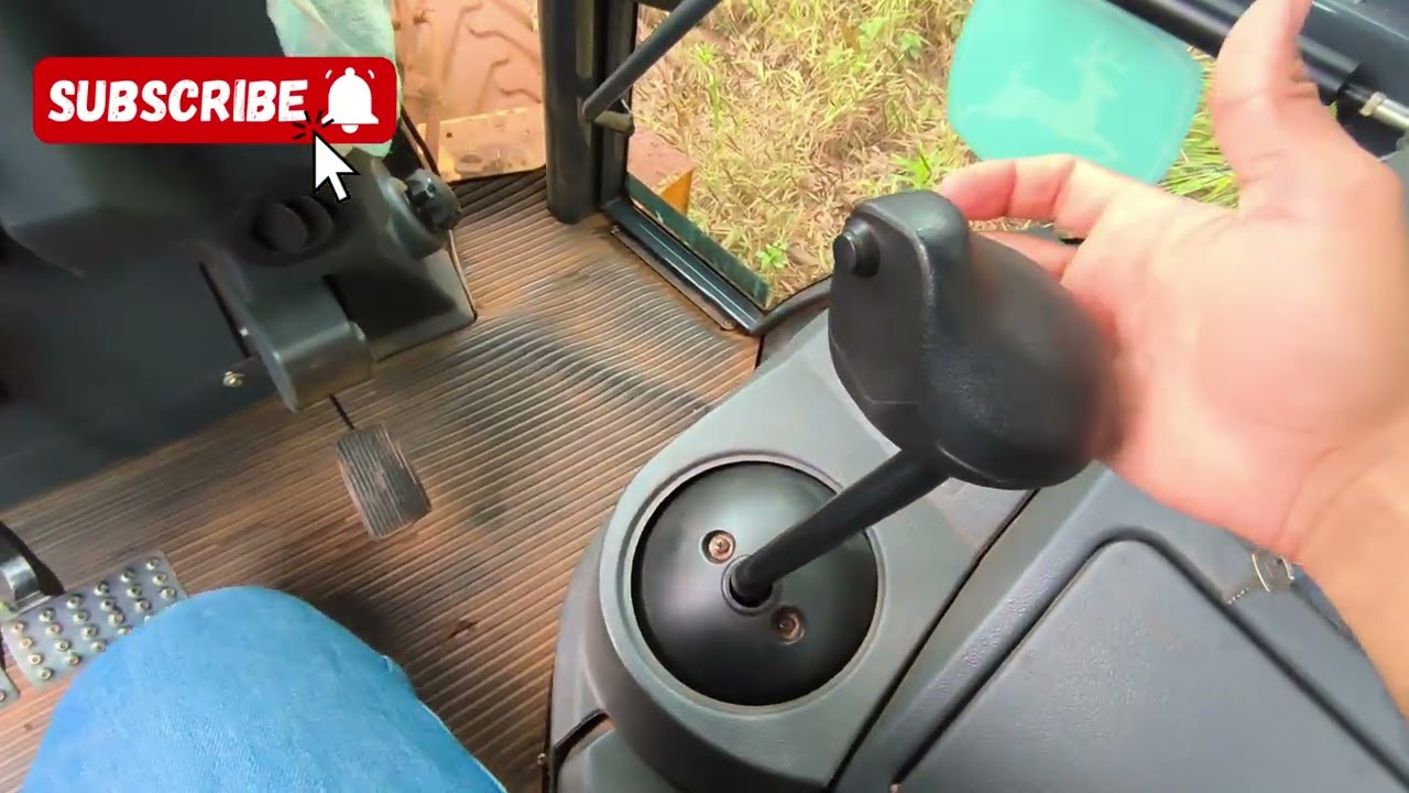 como operar retroescavadeira 2 comandos John Deere