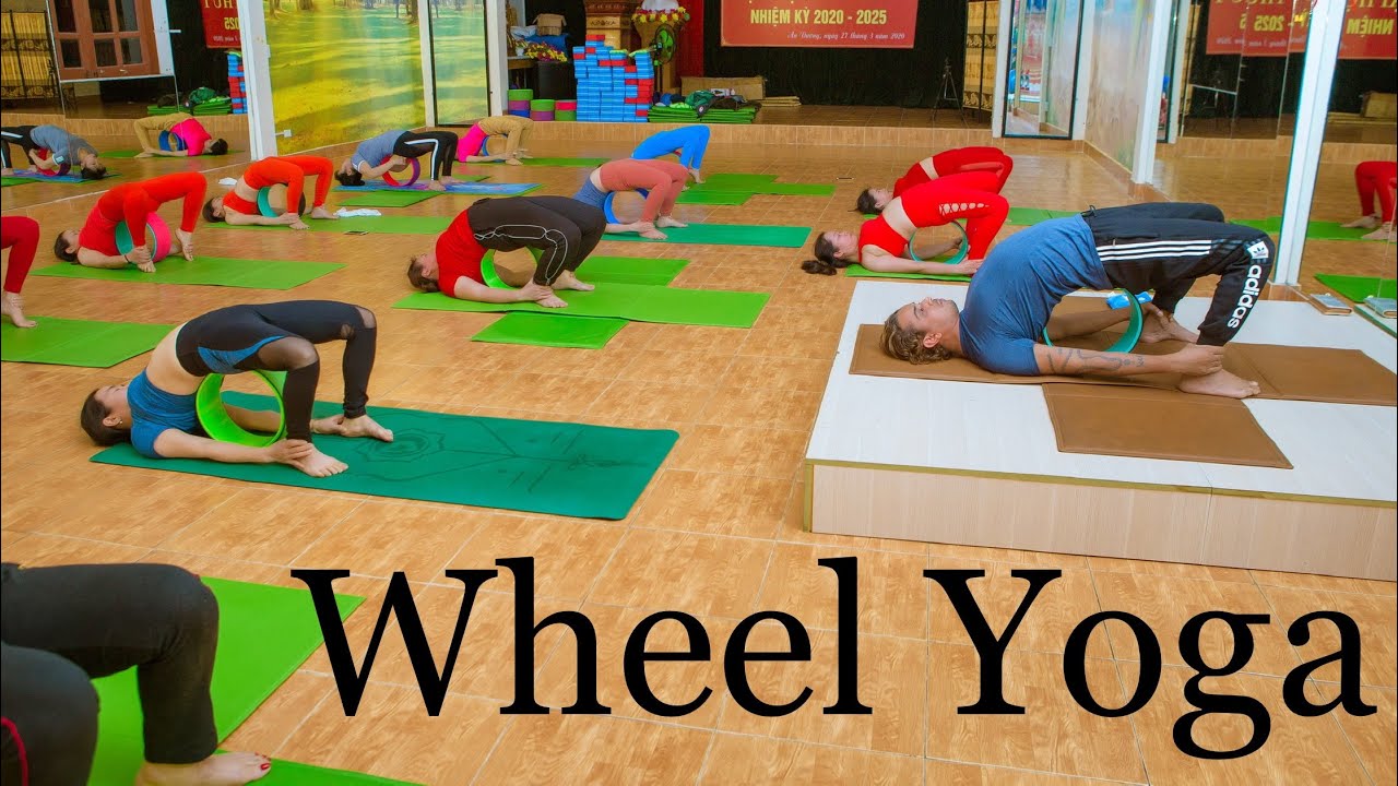 wheel yoga class/ Yoga with wheel/wheel yoga follow/wheel yoga for beginners/how to use yoga wheel.