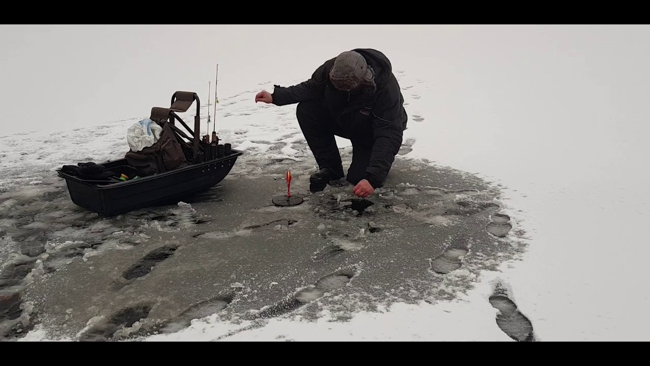 Kirjolohen pilkintä / ootto onginta heinolan venejärvellä joulukuussa 2019