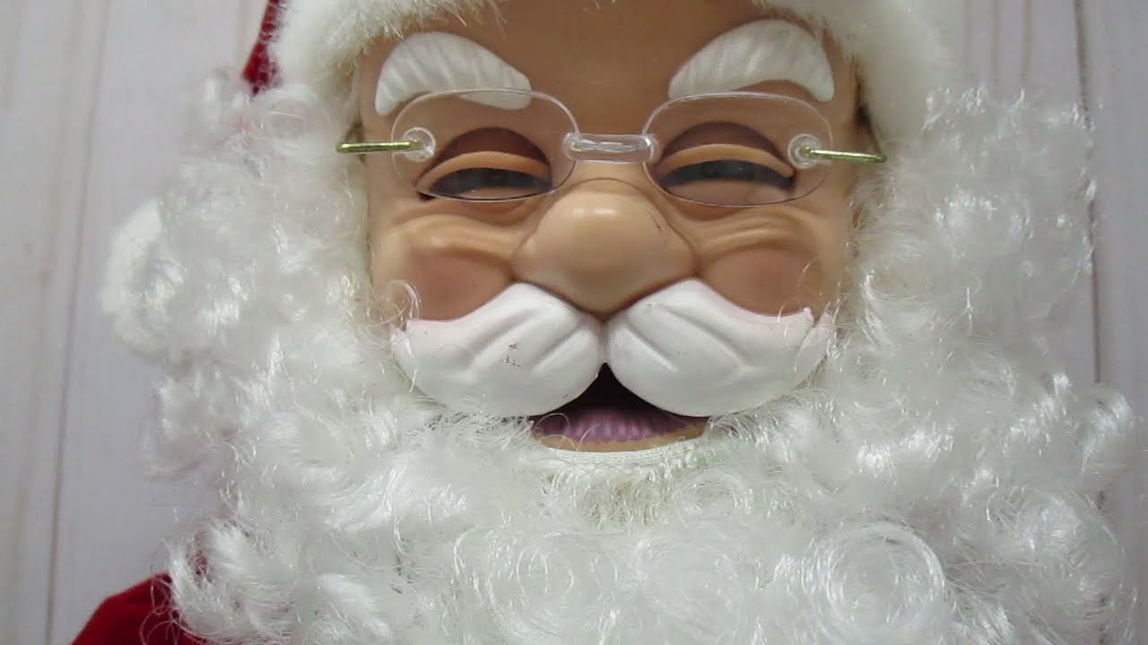 Santa Claus Reading Twas The Night Before Christmas vintage animated toy product demonstration