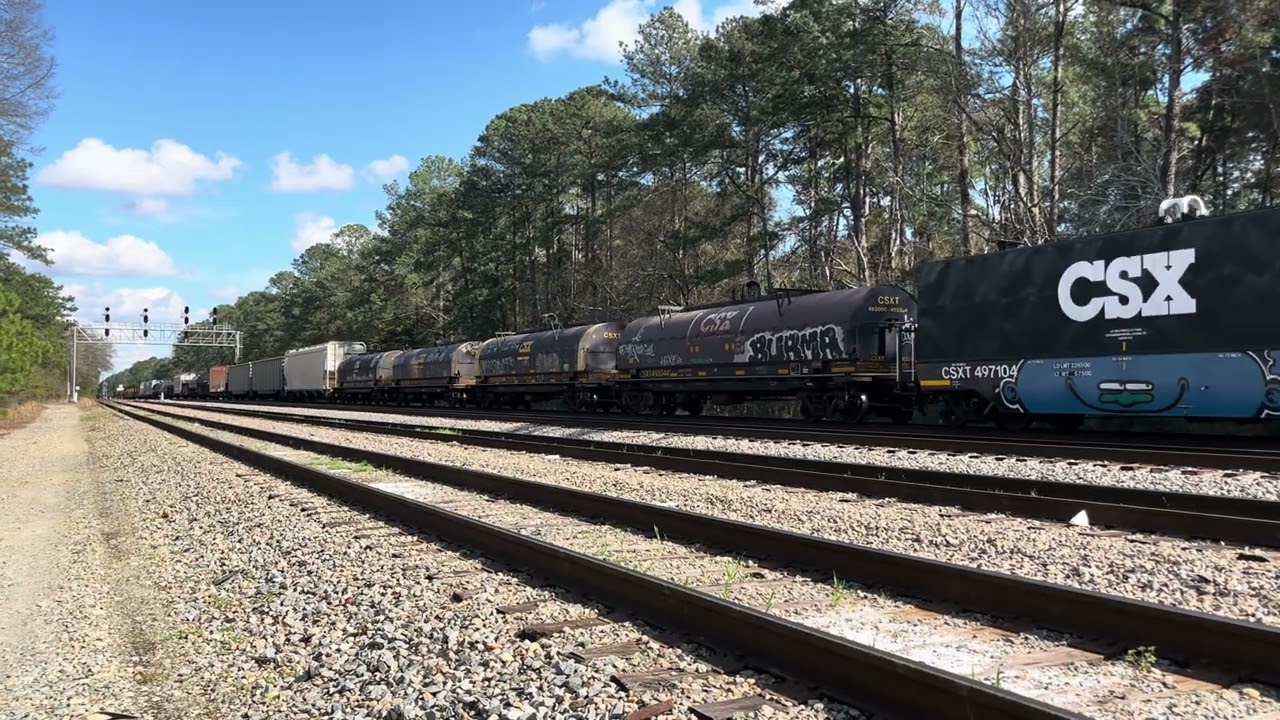 CSX 7212 Leads Short CSX M408-09 NB Manifest Train Departing Florence SC With Friendly Crew 