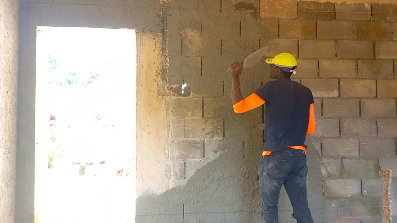 How to Perfectly Rough Cast your Walls after Screeding Building a House In Jamaica
