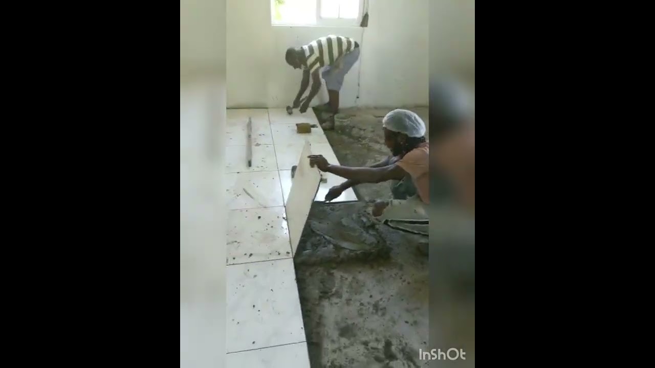Building my house in Jamaica | Part 13 casting the floor/ tiling