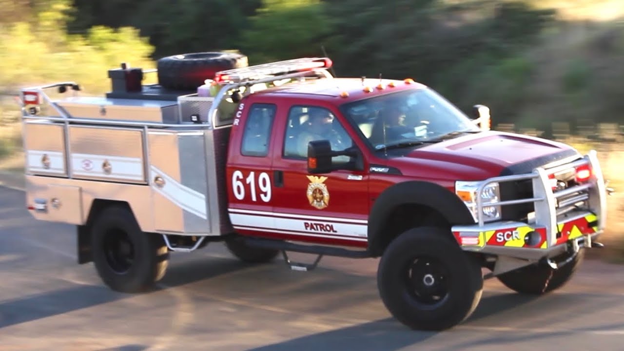 Brush Fire Trucks Responding And On Scene Of A Fire