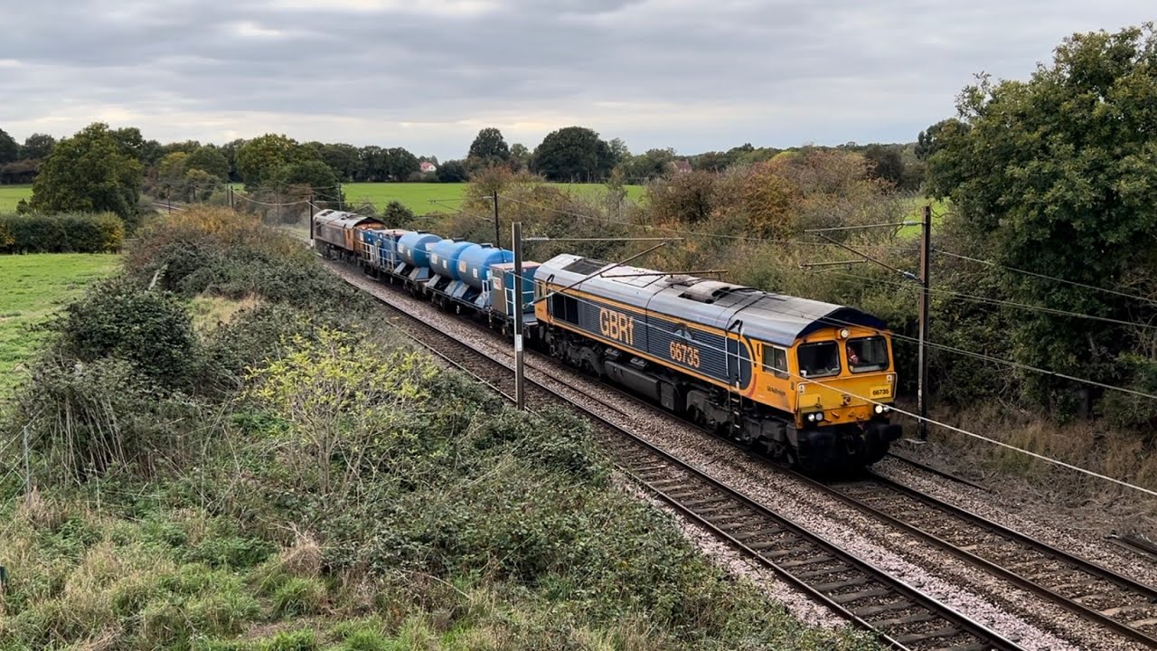 GBRf 66735 rushes past Moze Farm on 3S60