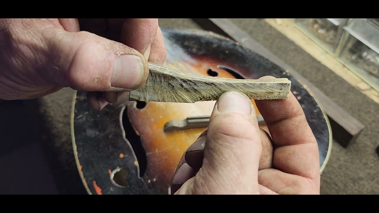 Vintage supertone mandolin part 3. guitar repair . bone saddle deer antler