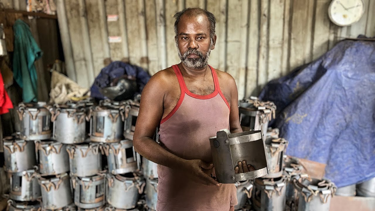 “Handmade Iron Stove Manufacturing in Local Metal Workshop”