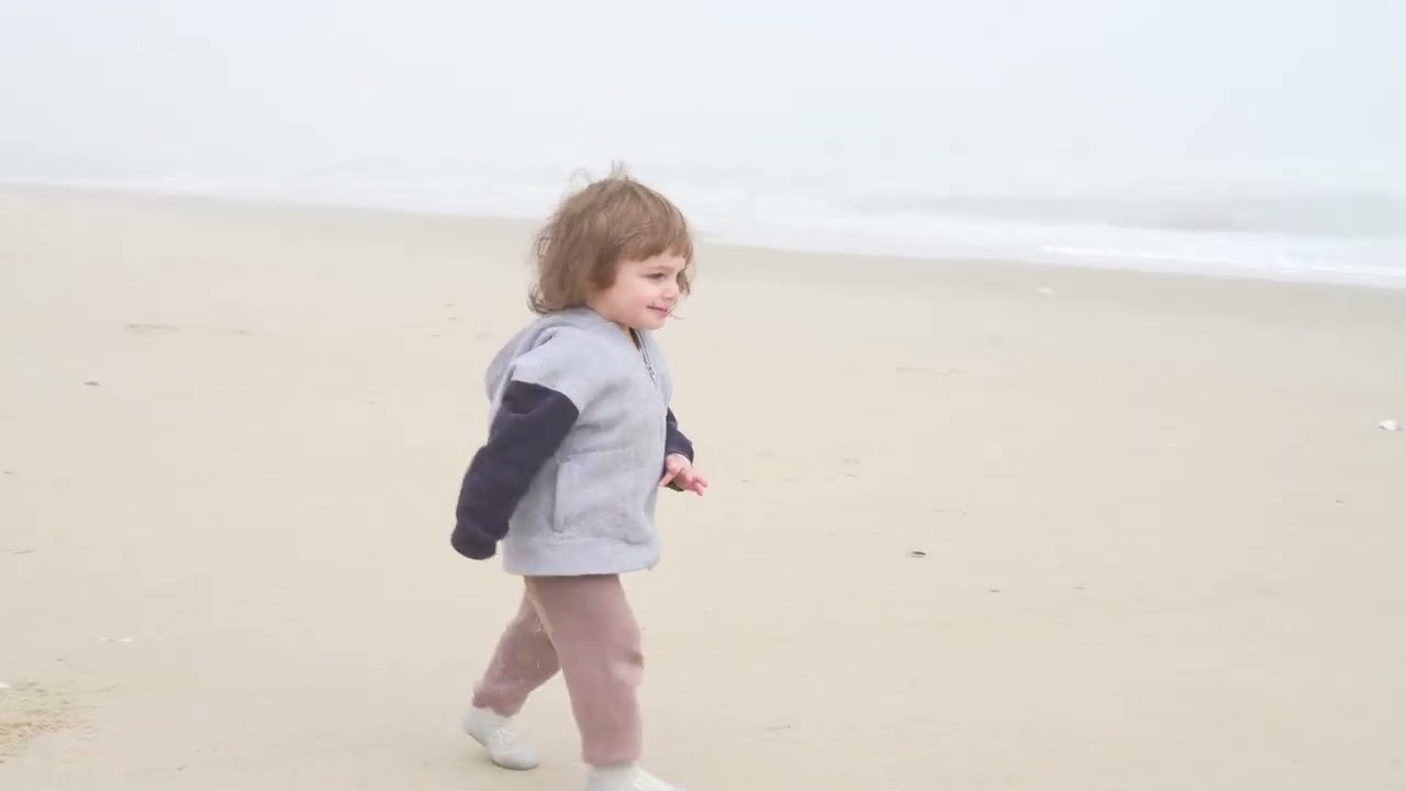 walking with my son at the beach