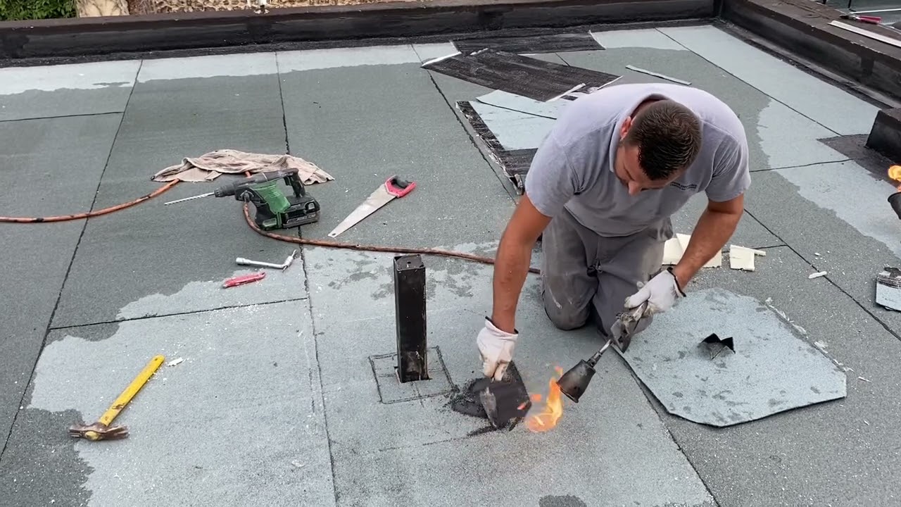Pose de poteau￼ d’ancrage de sécurité pour toitures terrasses