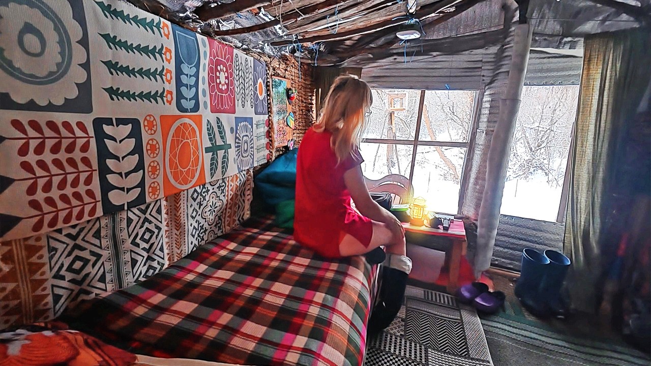 Woman Lives Alone in Winter in a Little Reed Hut