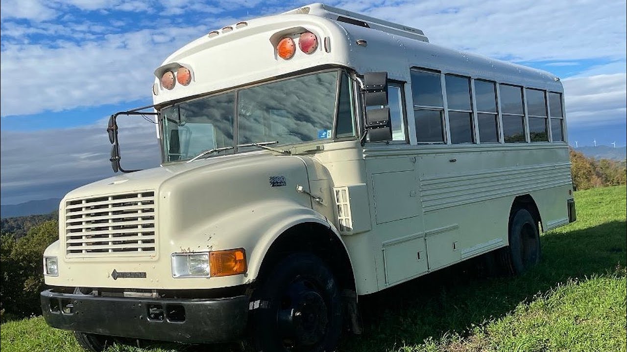2004 International Bluebird Bus Skoolie Tour | Cozy Tiny House Conversion!