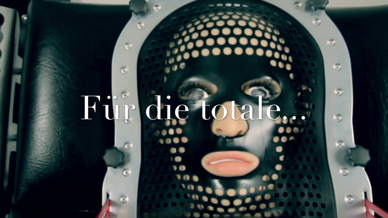 StyleFetish Latex-Stahl Kopffixierung &bdquo;Warrior&ldquo; f&uuml;r SM M&ouml;bel