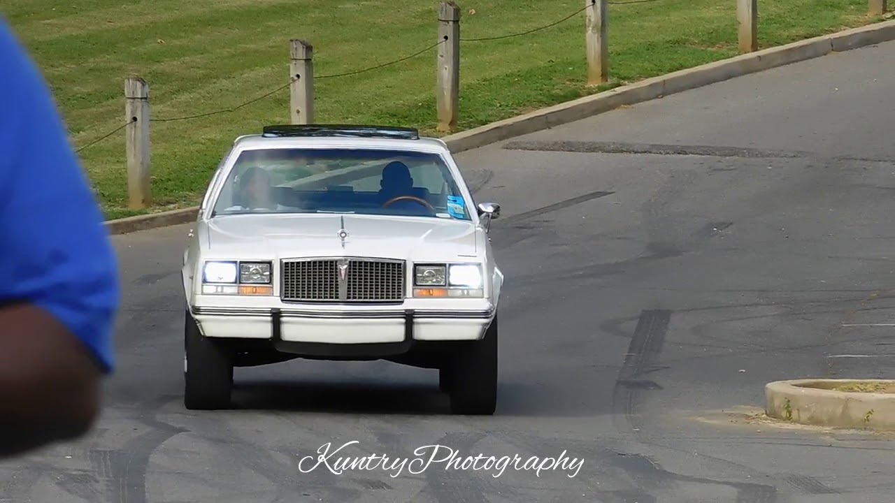 White Bonneville on color match dub wheels. mtown ryder 5 video shoot. Memphis whips