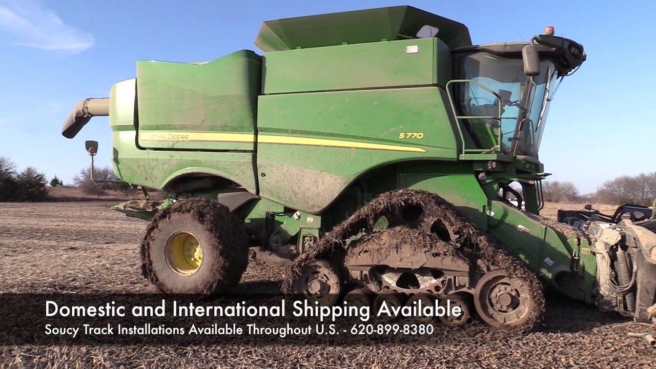 JOHN DEERE S780 COMBINE HARVESTING WITH SOUCY TRACKS