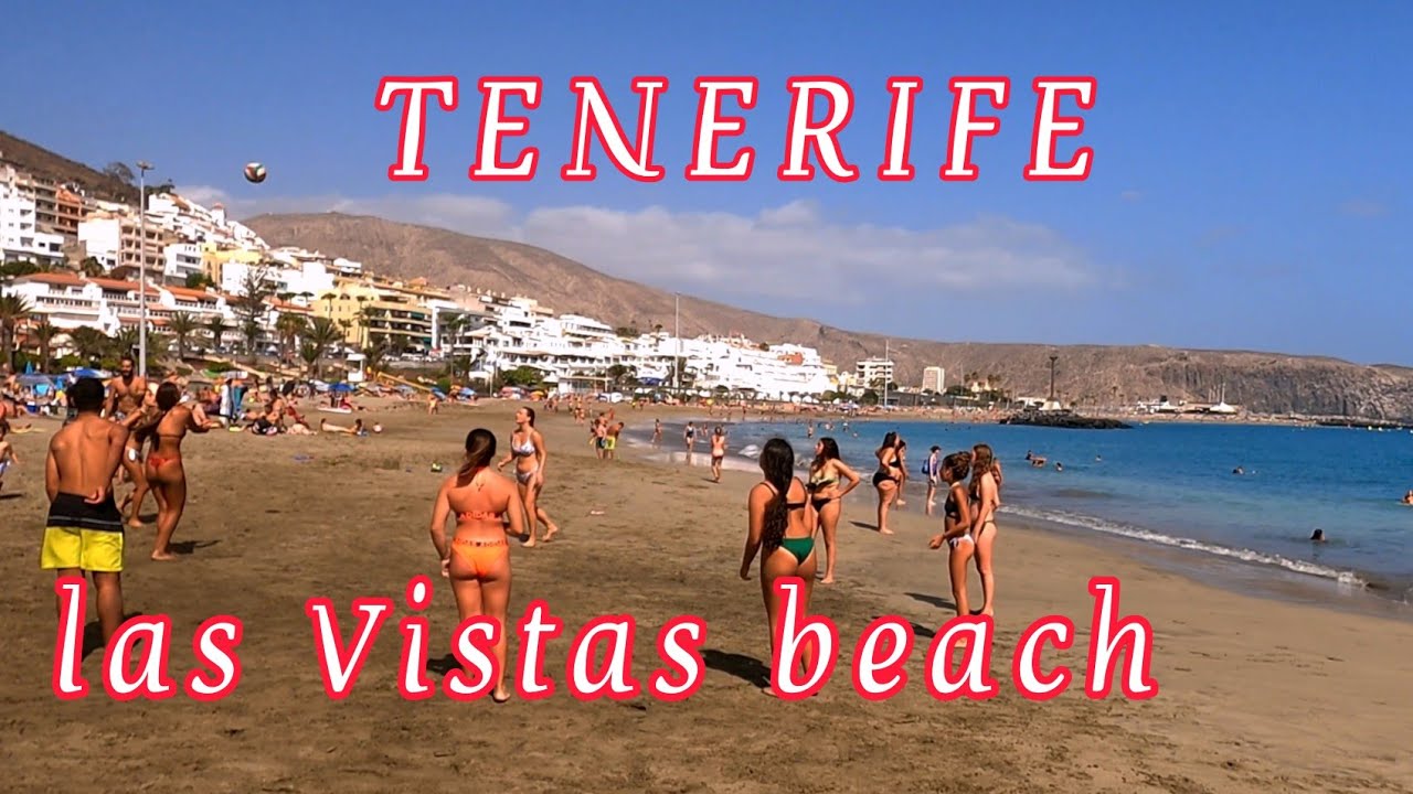 Walk along the Las Vistas beach.  Las Americas.  Tenerife.  Spain 4K