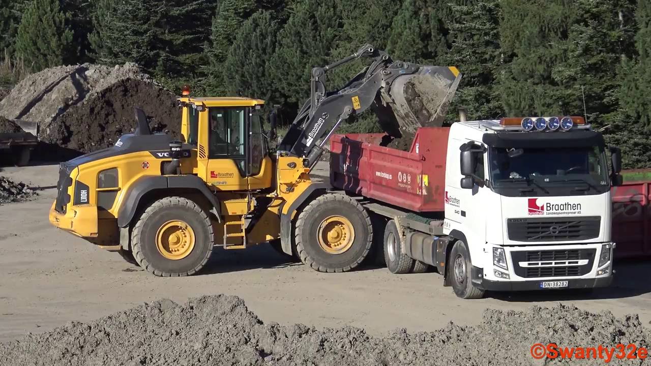 4K| Volvo L110H Wheel Loader Loading Volvo FH 540