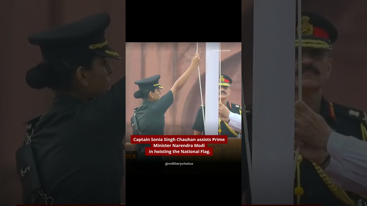 Captain Sonia Singh Chauhan assists Prime Minister Narendra Modi in hoisting the National Flag
