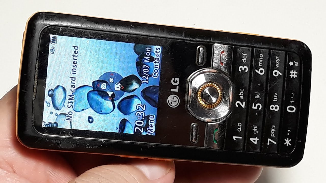 LG GM205. Крутой Ретро телефон 2009 года с 2.1-канальный звуком со стереодинамиками и сабвуфером