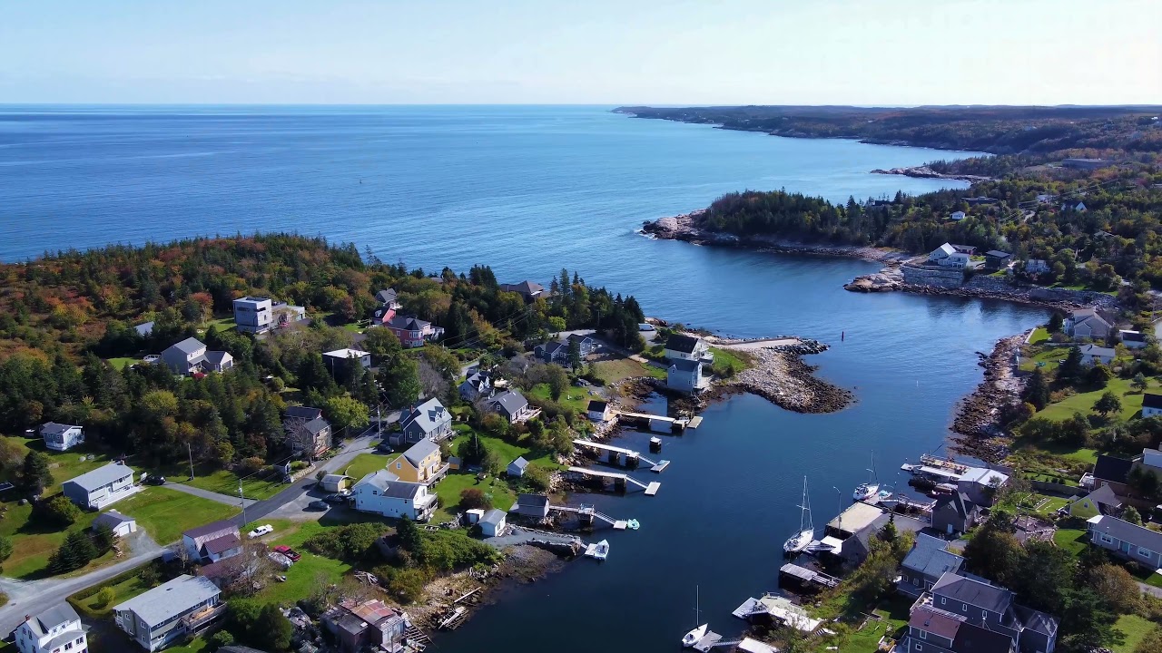 Seagulls, Rocky Shores and Boats in the Harbour at Herring Cove, Nova Scotia - DJI Mini 2  4K UHD