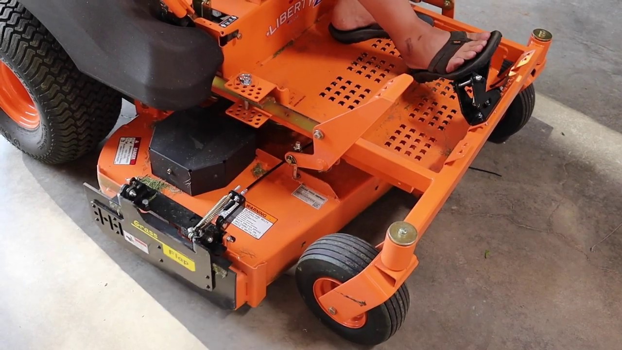 Grass Flap In Action (SCAG MOWER/ FOOT OPERATED)