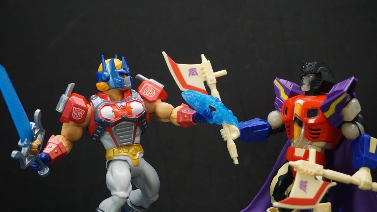 Masters of the Universe X Transformers Optimus Prime He-Man and Starscream Armor Scare Glow Review