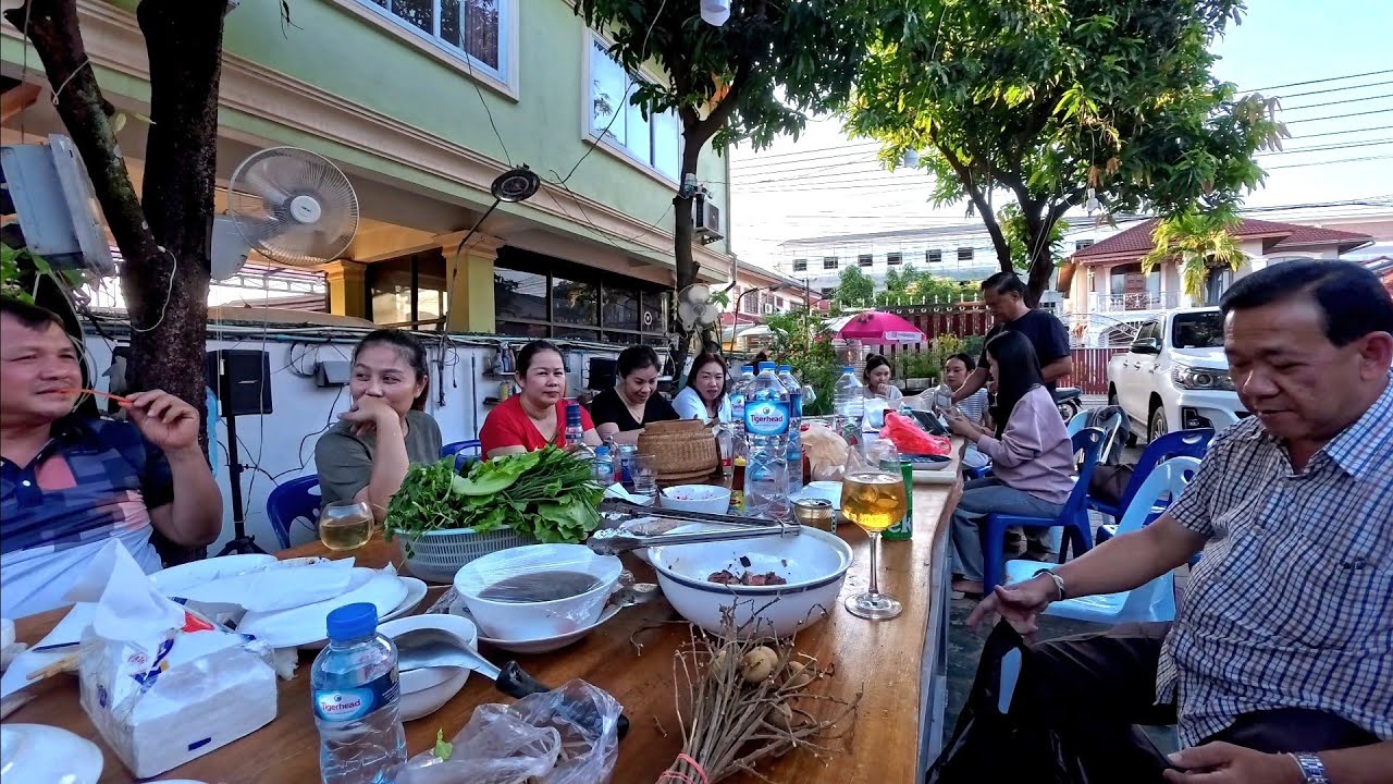 Cousins visiting Laos, have a family get together 