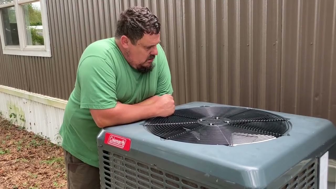 We had a USED Air Conditioning Unit Installed In Our Single Wide Mobile Home Rental!