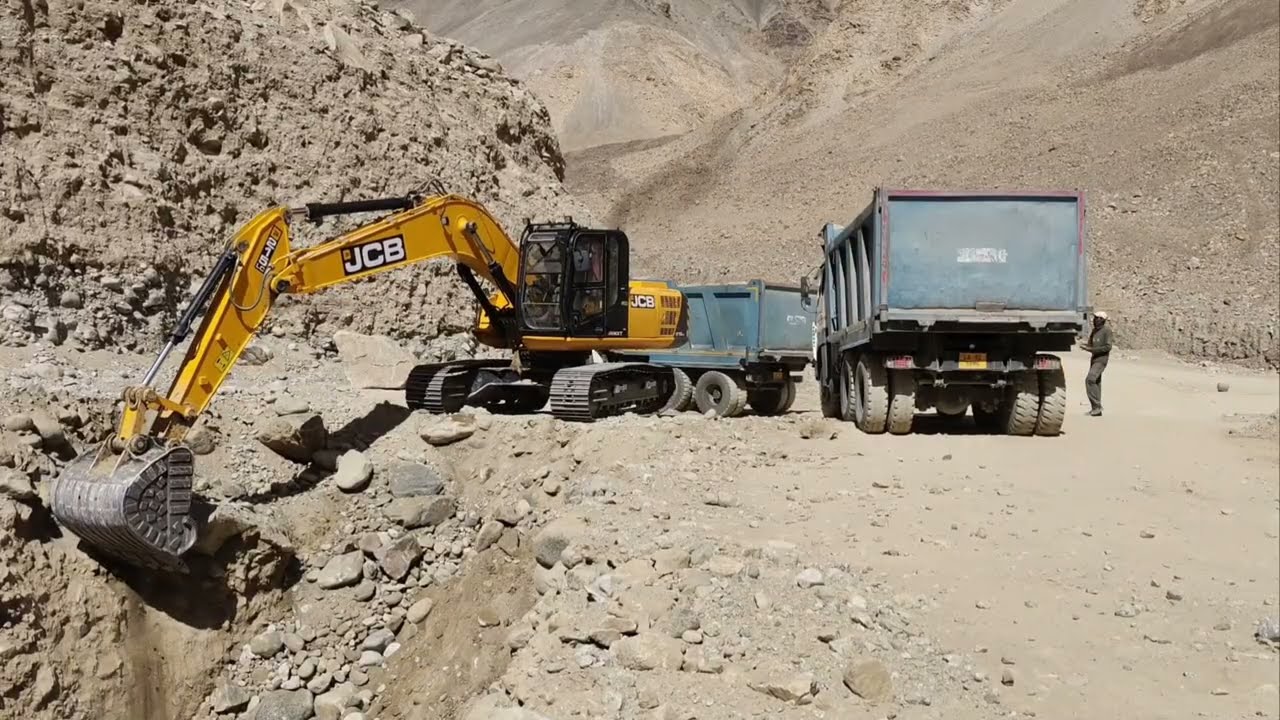 Mountain cutting And Wonderful Excavator Loading Dump Trucks 