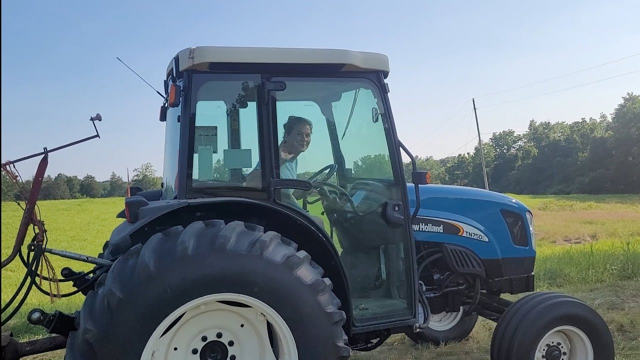 Hot Momma baling hay