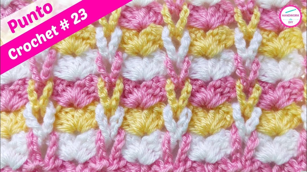 PUNTO CROCHET CON TRENZAS EN RELIEVE Y ABANICOS # 23