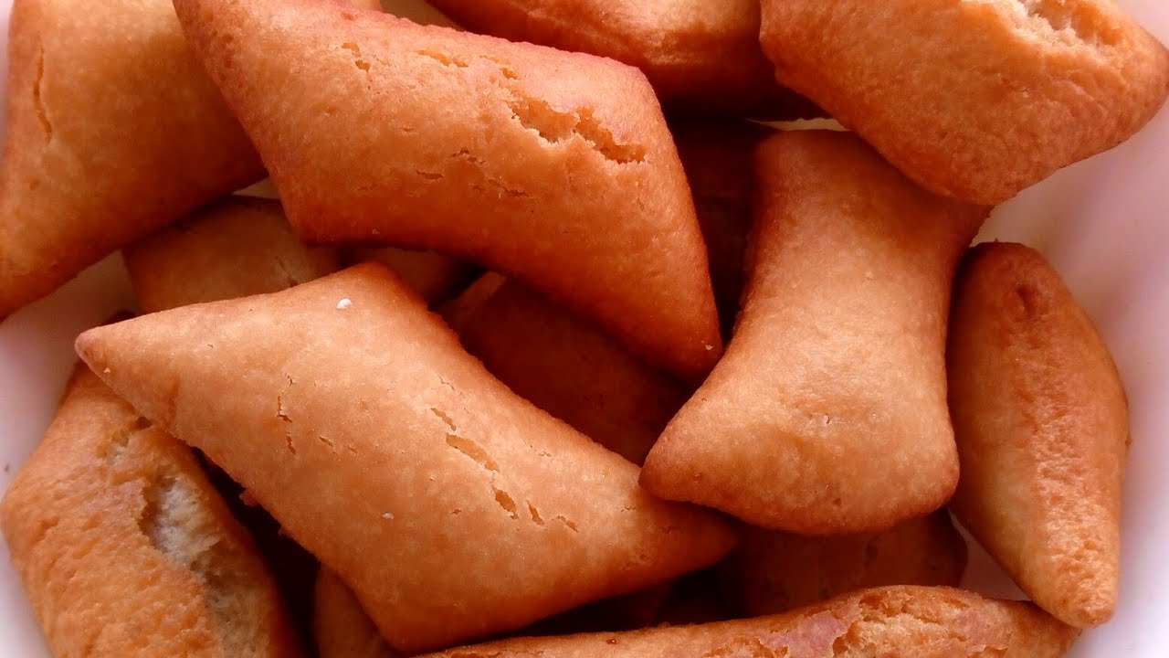 (Jinsi ya kupika mandazi kwa kutumia maziwa na mdalasini).Milk and Cinnamon Mandazi Recipe.