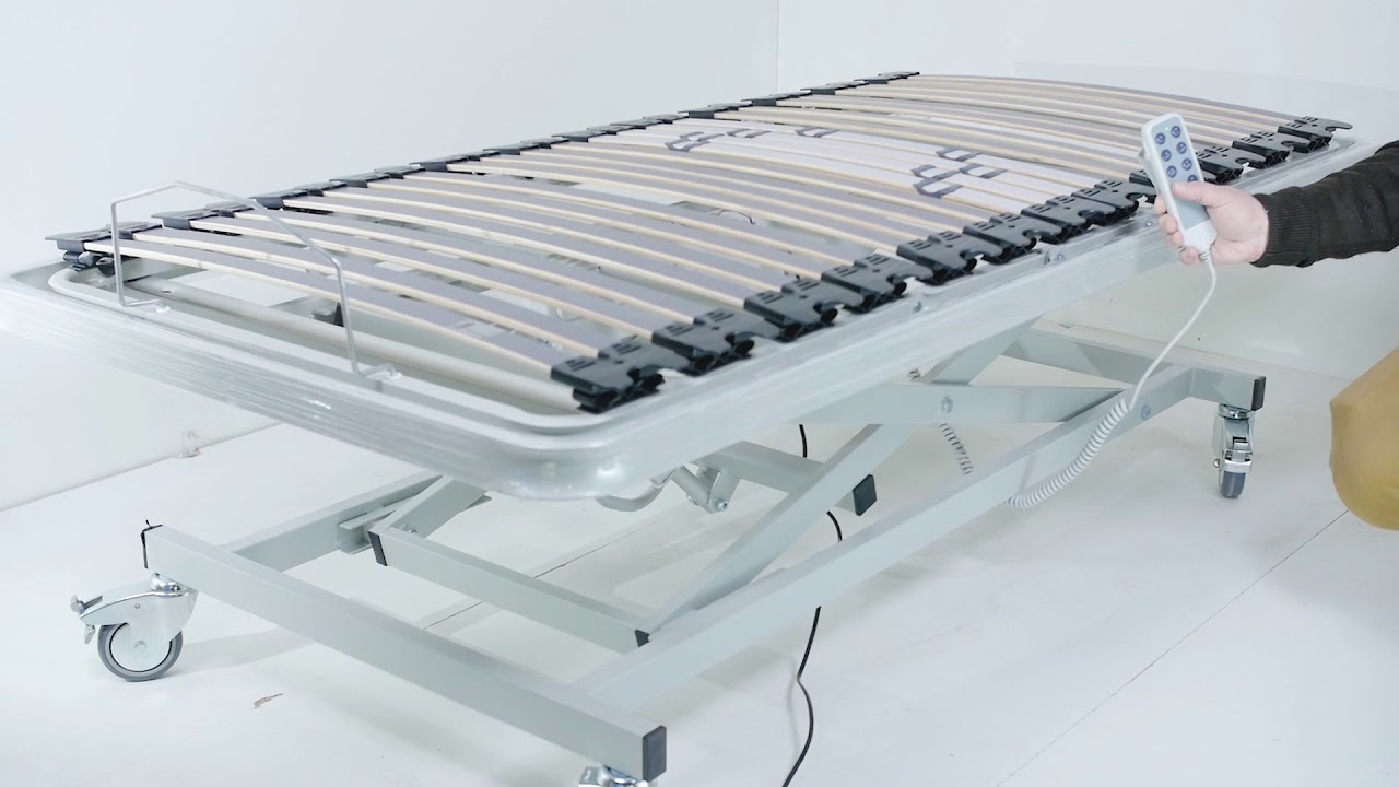 Cama Articulada El&eacute;ctrica - Montaje de carro elevador, cabecero, piecero y barandillas.