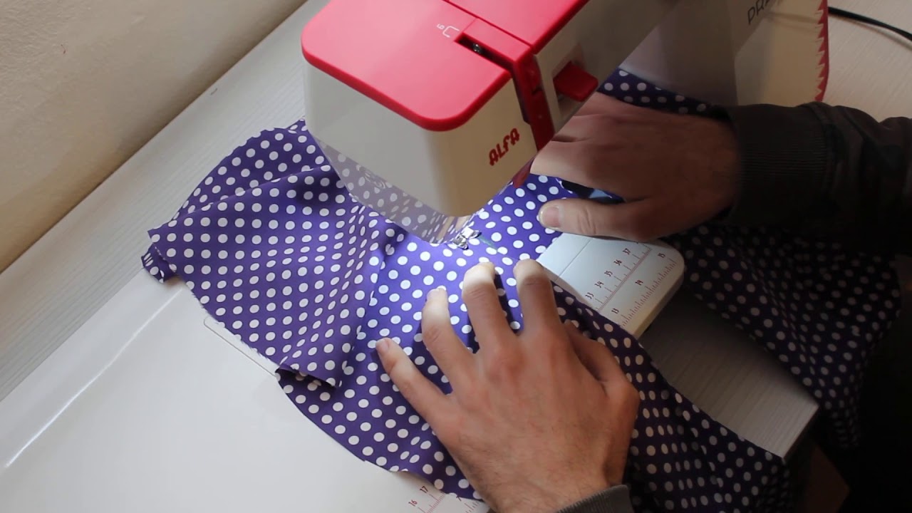 Coser volantes al traje de flamenca