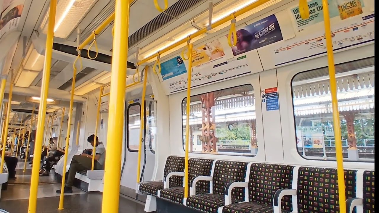 Journey On The District Line From Hammersmith To Ealing Broadway Station