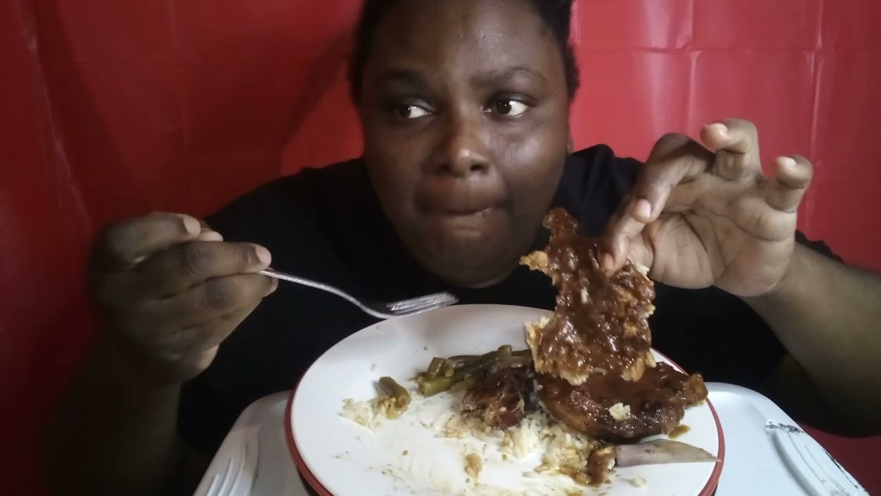 SMOTHER PORK CHOP, WHITE RICE & BEANS
